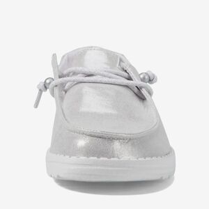 Silver metallic Hey Dude shoes.